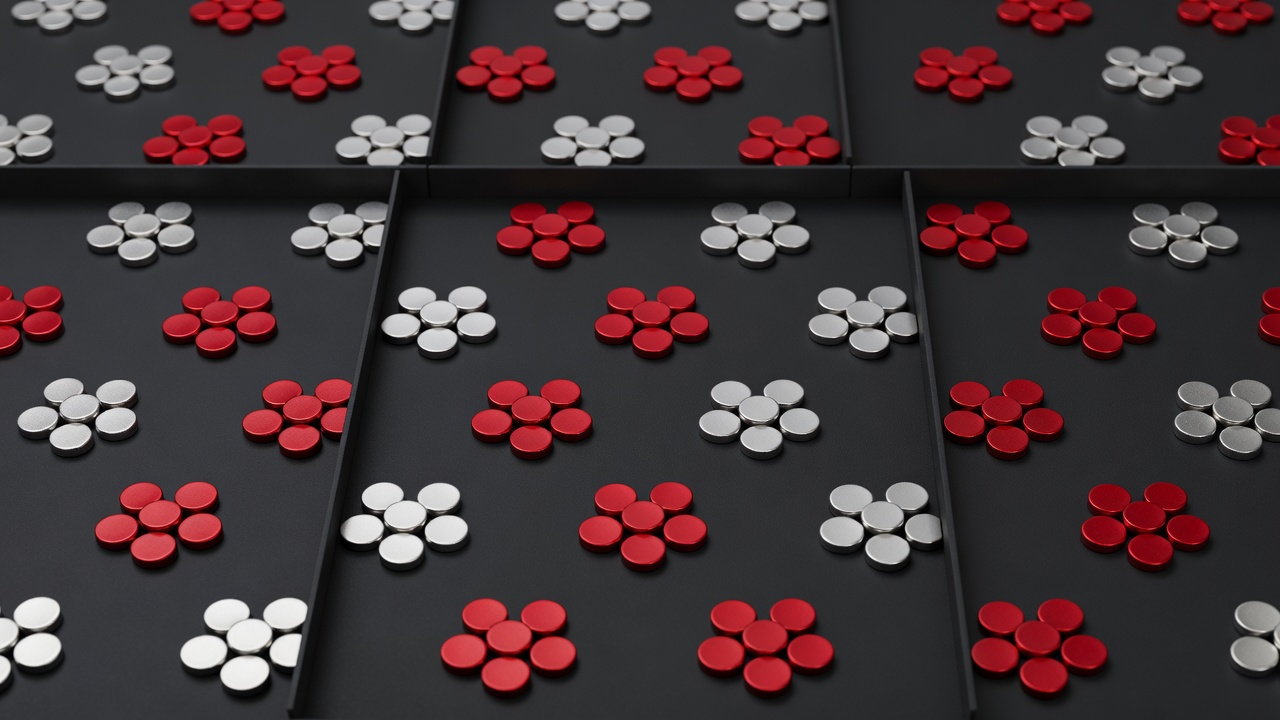 Small groups of silver and crimson audience tokens separated by charcoal dividers
